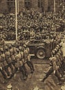 Adolf Hitler waving to crowds from his car at the head of a parade. Location is unidentified. Reproduction of antique photo Royalty Free Stock Photo