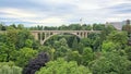 Adolphe bridge surrounded by green trees in Luxembourgh