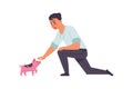 Adopted pets. People taking domestic animals from vet clinics and dog shelter. Man petting mini pig. Person playing with pink home Royalty Free Stock Photo