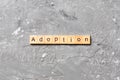 Adoption word written on wood block. adoption text on table, concept Royalty Free Stock Photo