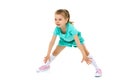 Adorable active little girl doing split on floor