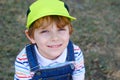 Adorable active little kid boy having fun on Miami beach, Key Biscayne. Happy cute child relaxing, playing and enjoying