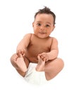 Adorable African-American baby in diaper on white background Royalty Free Stock Photo