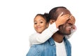 adorable african american daughter closing eyes to father