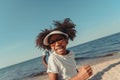 adorable african american girl in sunglasses running Royalty Free Stock Photo