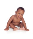 Adorable african baby in diaper sitting on the floor Royalty Free Stock Photo