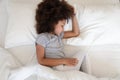 Adorable african girl sleeping well in cozy bed, top view Royalty Free Stock Photo