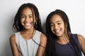 Adorable african twin little girls on studio gray background Royalty Free Stock Photo