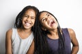 Adorable african twin little girls on studio gray background Royalty Free Stock Photo