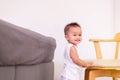 Adorable asian baby boy standing in bedroom,Happy and laughing new born kid Royalty Free Stock Photo