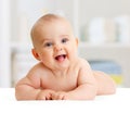 Adorable baby boy lying in bedroom Royalty Free Stock Photo