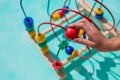 Baby, child playing in nursery. Happy healthy child having fun with colorful toy at home.Colorful toy labyrinth Royalty Free Stock Photo