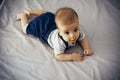 Adorable baby boy practicing tummy time Royalty Free Stock Photo