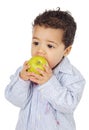 Adorable baby eating an apple