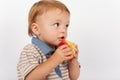 Adorable baby eating apple Royalty Free Stock Photo