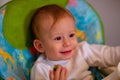 Adorable baby eating broccoli Royalty Free Stock Photo