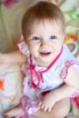 Adorable baby girl with blue eyes and a smile Royalty Free Stock Photo