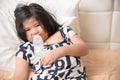 Adorable baby girl holding milk bottle and drinking Royalty Free Stock Photo