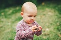 Adorable baby girl playing outside Royalty Free Stock Photo