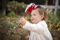 Adorable Baby Girl Playing with a Toy in Park Royalty Free Stock Photo