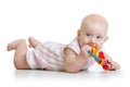 Adorable baby girl teething and chewing teethers Royalty Free Stock Photo