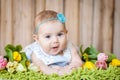Adorable baby girl with tulips Royalty Free Stock Photo