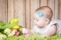 Adorable baby girl with tulips Royalty Free Stock Photo