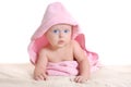 Adorable baby girl under a pink towel Royalty Free Stock Photo