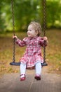 Adorable baby girl wearing a red dress Royalty Free Stock Photo