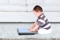 Adorable baby with laptop Royalty Free Stock Photo