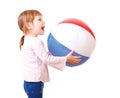 Adorable baby playing with a colorful beach ball Royalty Free Stock Photo