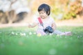 Adorable baby playing and fun on the ground. Royalty Free Stock Photo