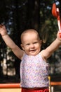 Adorable baby plays in a sandbox