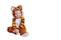 Adorable baby in tiger costume playing smiling acting isolated on white with blank space