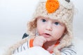 Adorable Baby Touching Face Owl Hat Royalty Free Stock Photo