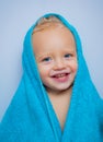 Adorable baby under a hooded towel after bath. Bubble Bath time. Happy bath time. Royalty Free Stock Photo