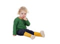 Adorable baby with yellow gumboots