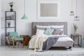 Adorable bedroom with mint chair Royalty Free Stock Photo