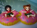 Adorable BJD Ball Joint Doll branded LATI in swimming suit. They`re ready to play water with colorful pool floats.
