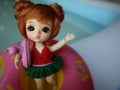 Adorable BJD Ball Joint Doll branded LATI in swimming suit. They`re ready to play water with colorful pool floats.