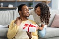 Adorable black girl greeting her smiling father Royalty Free Stock Photo