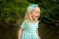 Adorable blond girl laughing