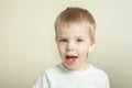 Adorable blond toddler laughing Royalty Free Stock Photo