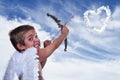 Adorable boy dressed as Cupid