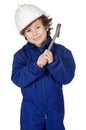 Adorable boy dressed worker in a hammer and a helmet Royalty Free Stock Photo