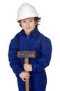 Adorable boy dressed worker in a hammer and a helmet Royalty Free Stock Photo