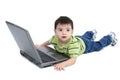 Adorable Boy With Laying On White Floor Working On Laptop Royalty Free Stock Photo