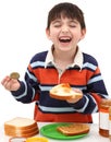 Adorable Boy Making Peanutbutter Sandwich Royalty Free Stock Photo