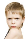 Adorable boy with upset expression Royalty Free Stock Photo