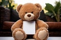 Adorable brown teddy, seated on white backdrop, awaits your cuddles